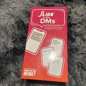 Slide in the DMs Card Game by What Do You Meme? - Pink